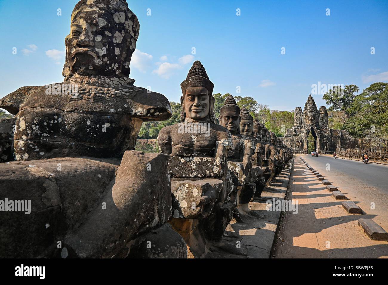 Stone statues lining the bridge at the South Gate of Angkor Thom, part ...