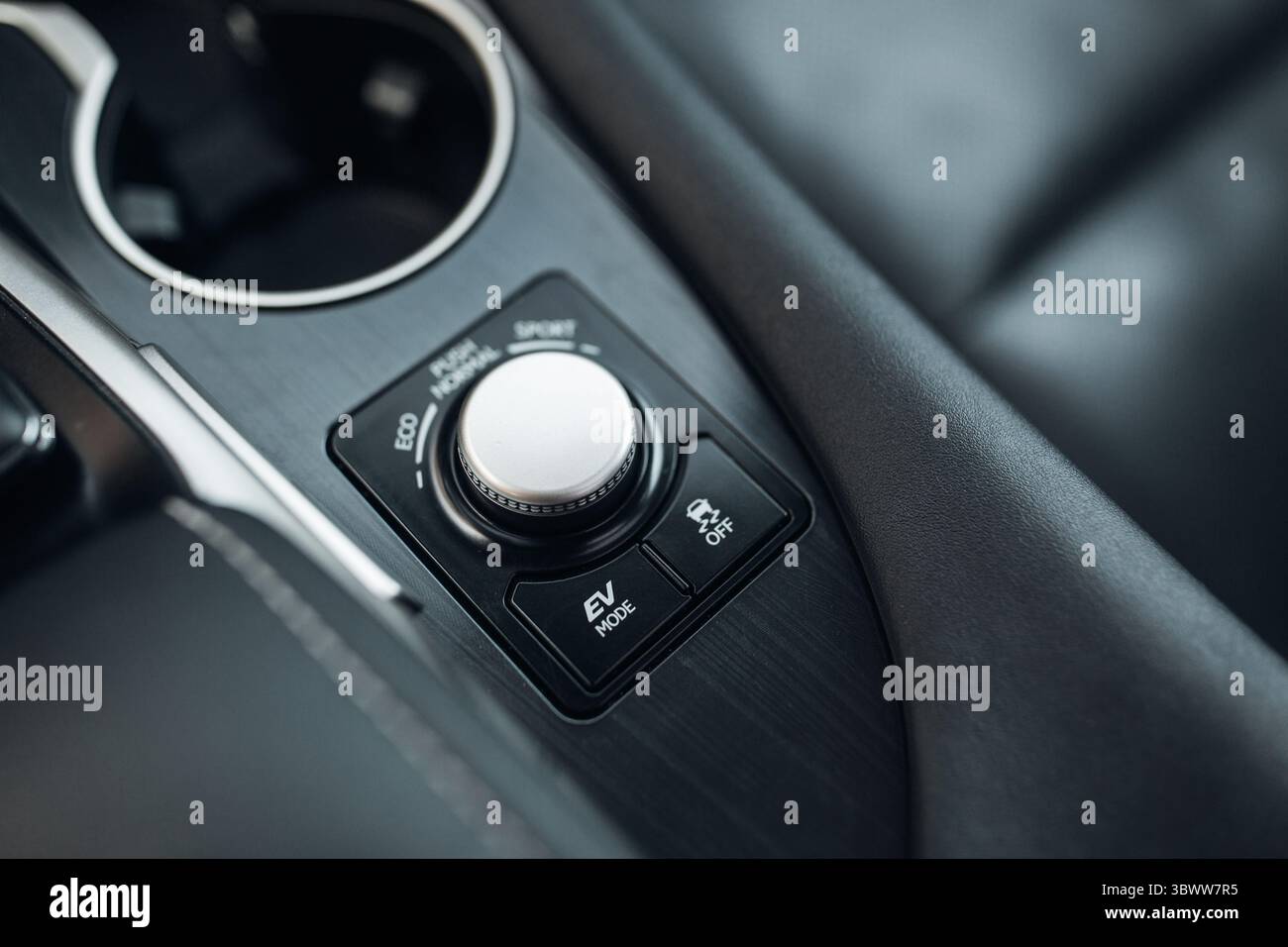 Hybrid car ev mode control panel close up view Stock Photo - Alamy
