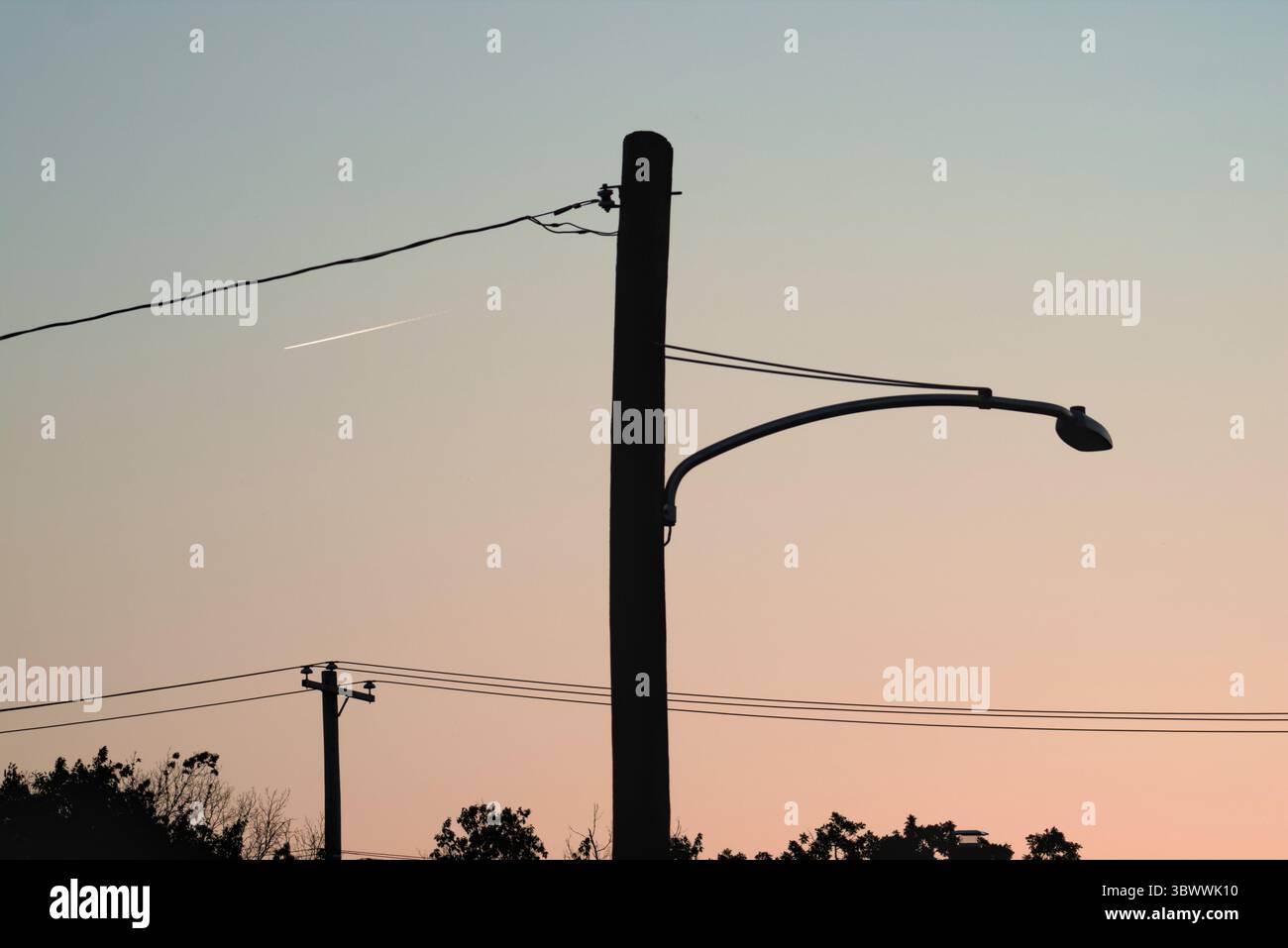 street light against a blue sky background with clouds Stock Photo