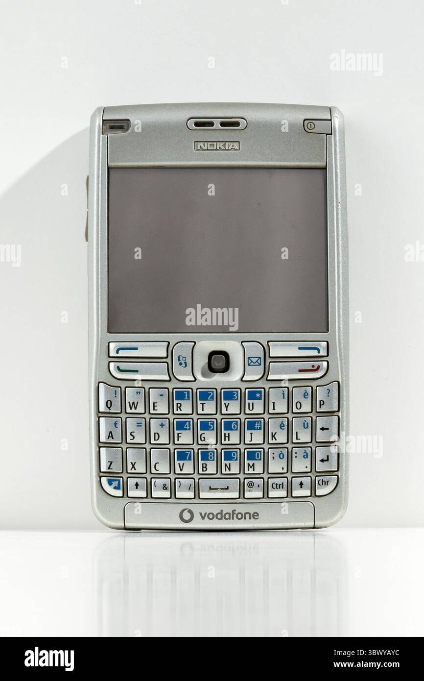 Milan, Lombardy, Italy- February 10, 2025: Nokia E61 vintage mobile phone with its physical keyboard and Vodafone branding, representing a nostalgic e Stock Photo