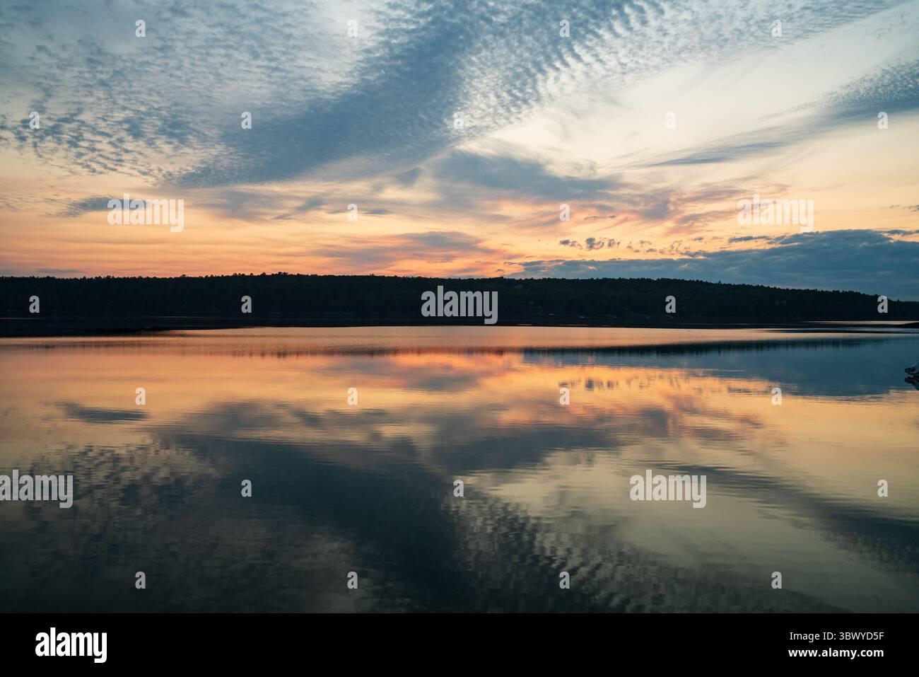 Sunset over a river Stock Photo