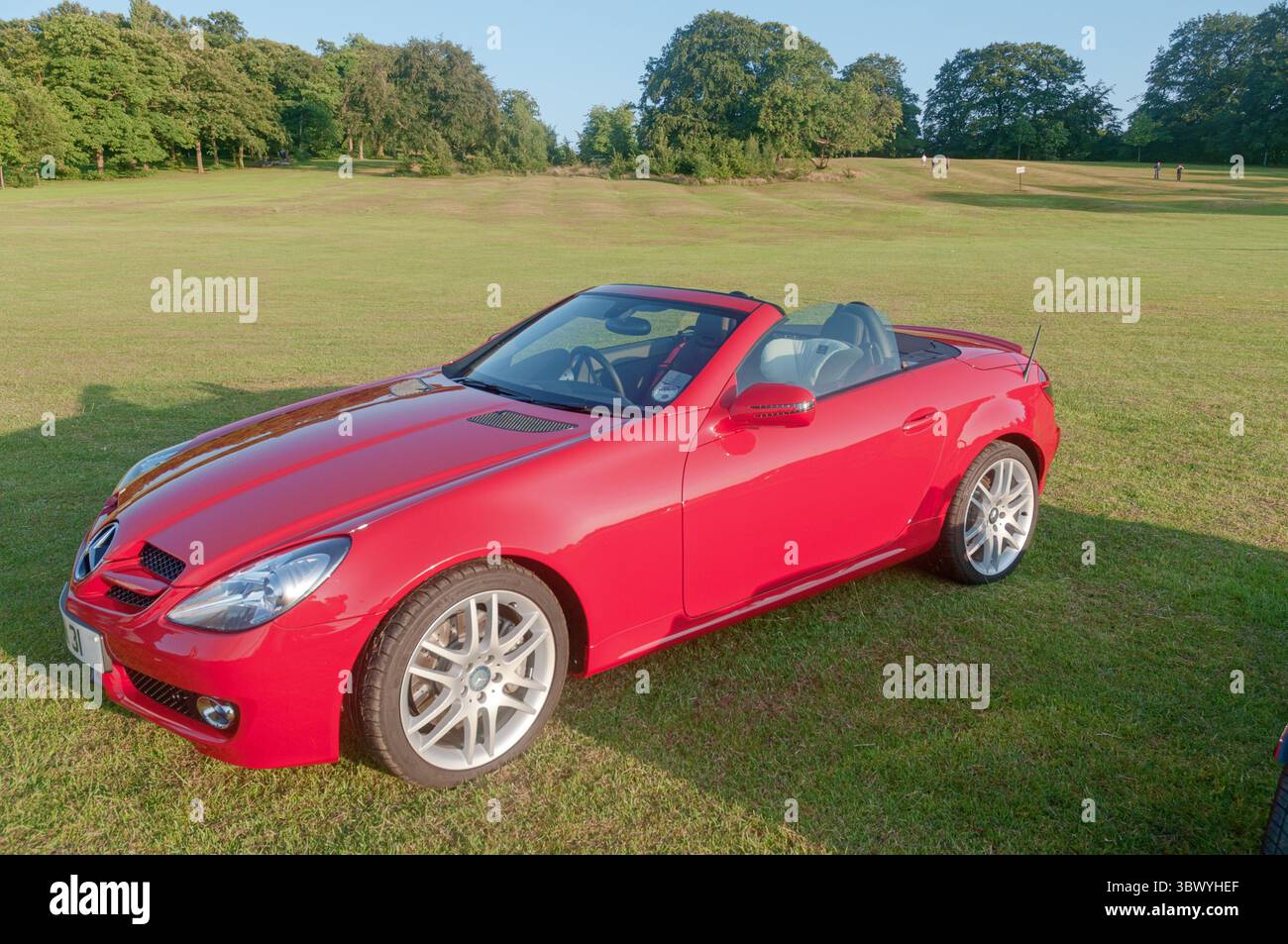 A red Mercedes SLK car at a classic vehicle show in Yorkshire England ...