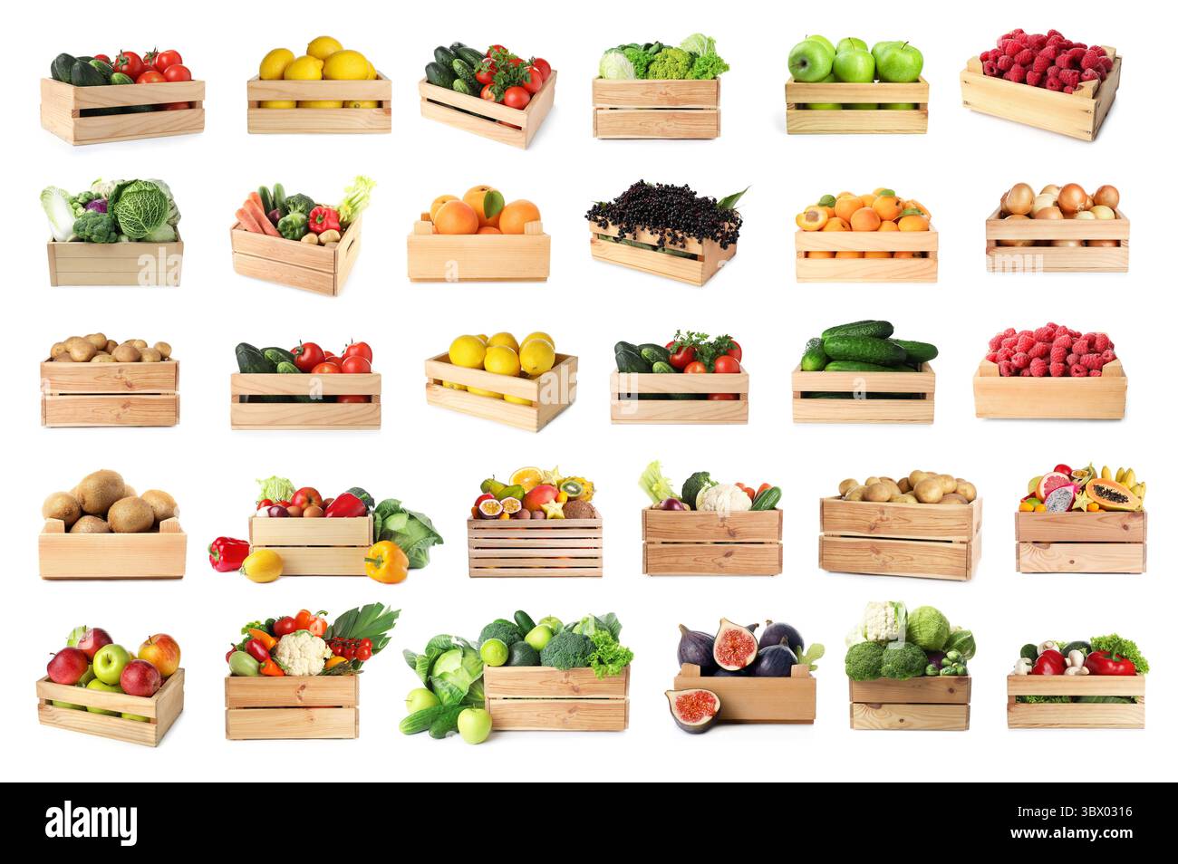 Many fresh ripe fruits and vegetables in wooden crates isolated on ...