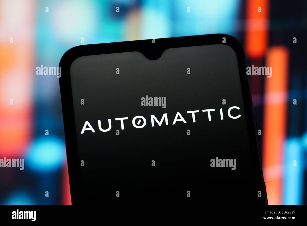In this photo illustration, the Automattic logo is seen displayed on a ...