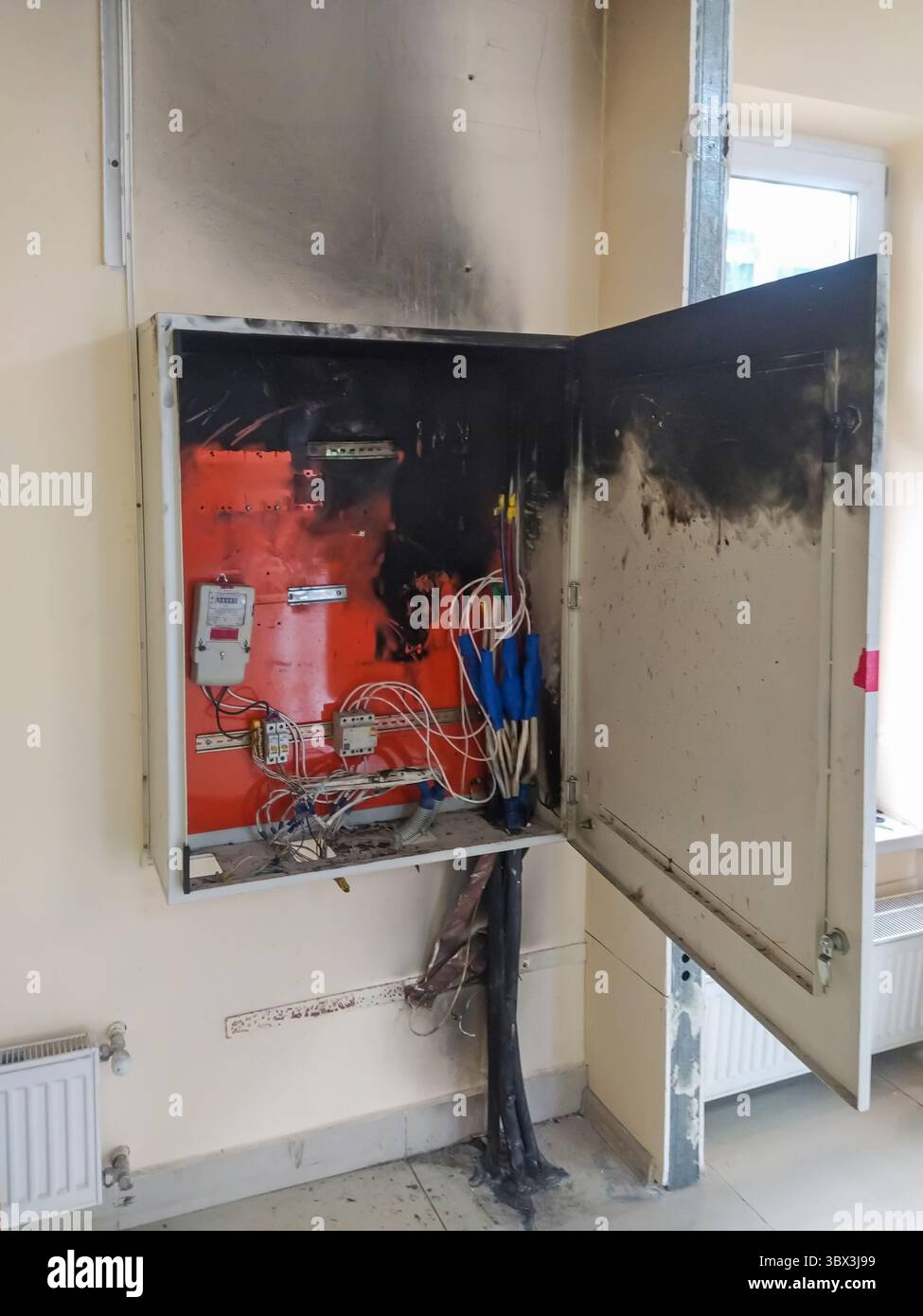 Damaged electrical panel after a fire short circuit. Consequences of a ...