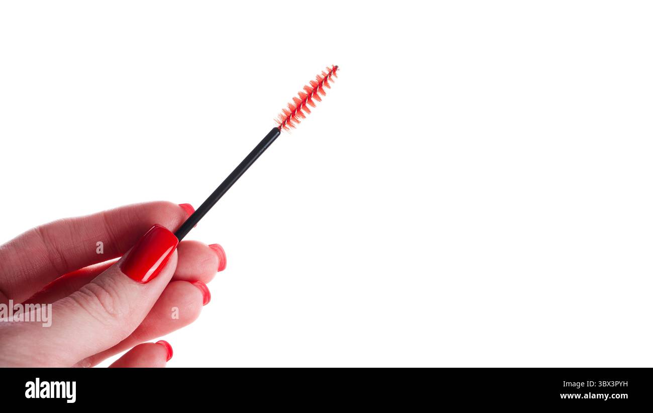 Disposable brush for eyelashes and eyebrows. Isolated on white background. Stock Photo