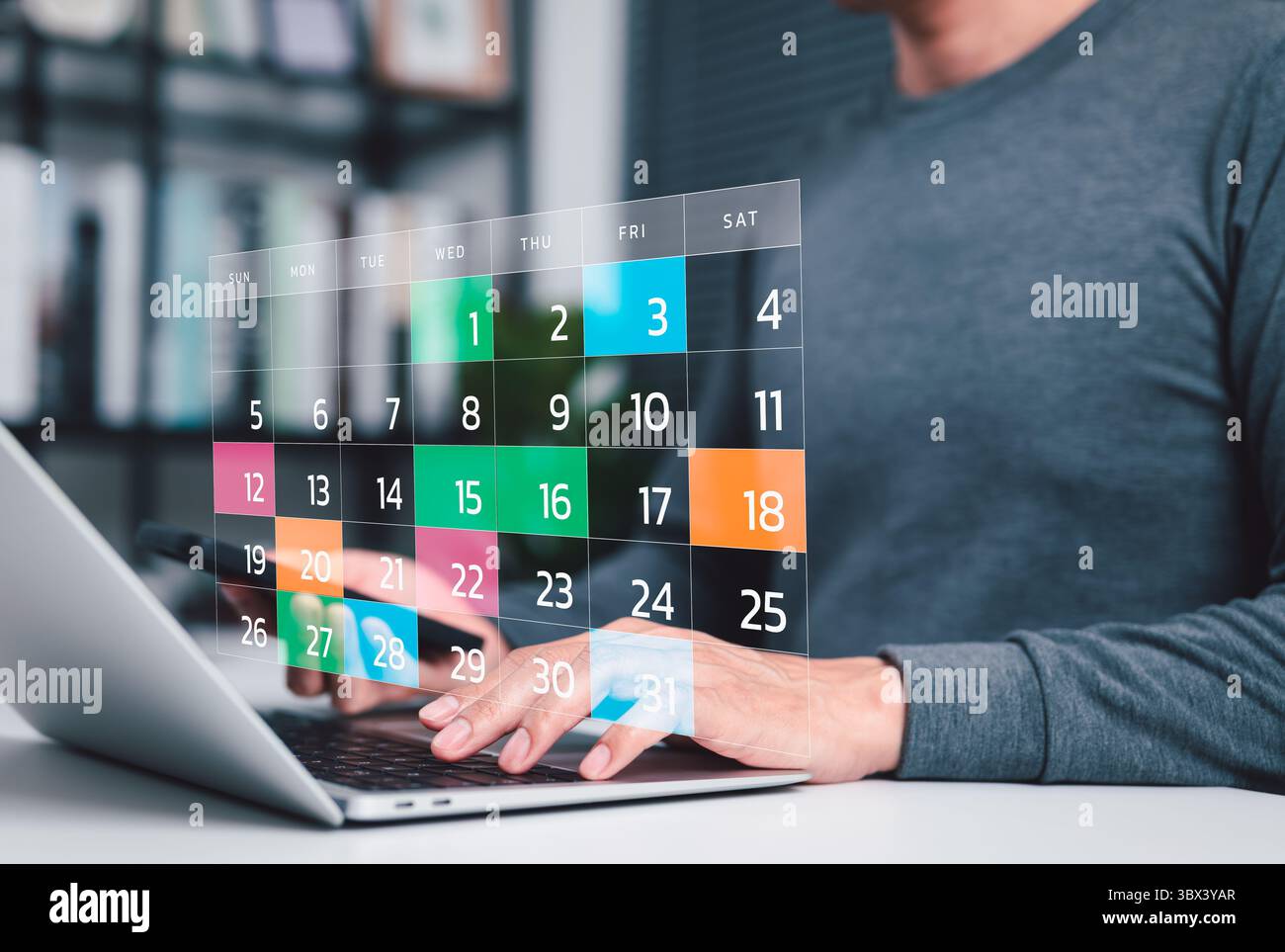 Time management and calendar planning concept. A person using laptop ...