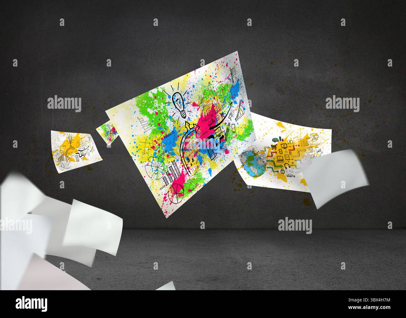 Sheets with graphics and splashes over grey wall Stock Photo