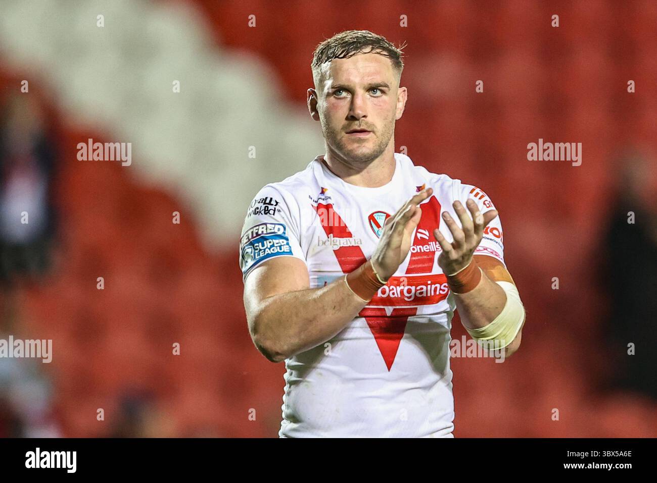 Matty Lees of St. Helens applauds the fans after the game during the ...