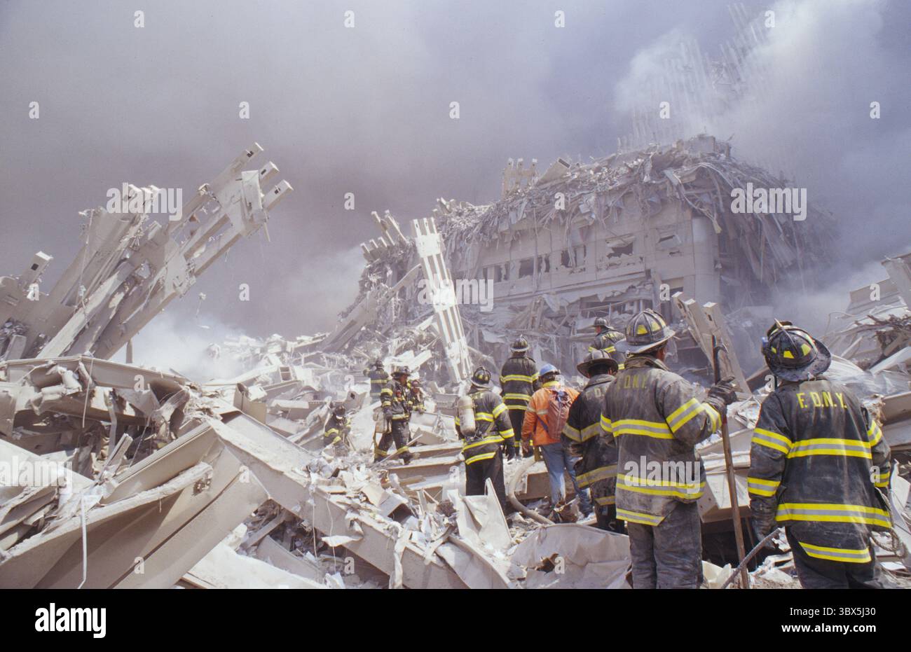 Wtc Fire September 11, 2001, New York, New York, USA: Amid twisted metal and ...