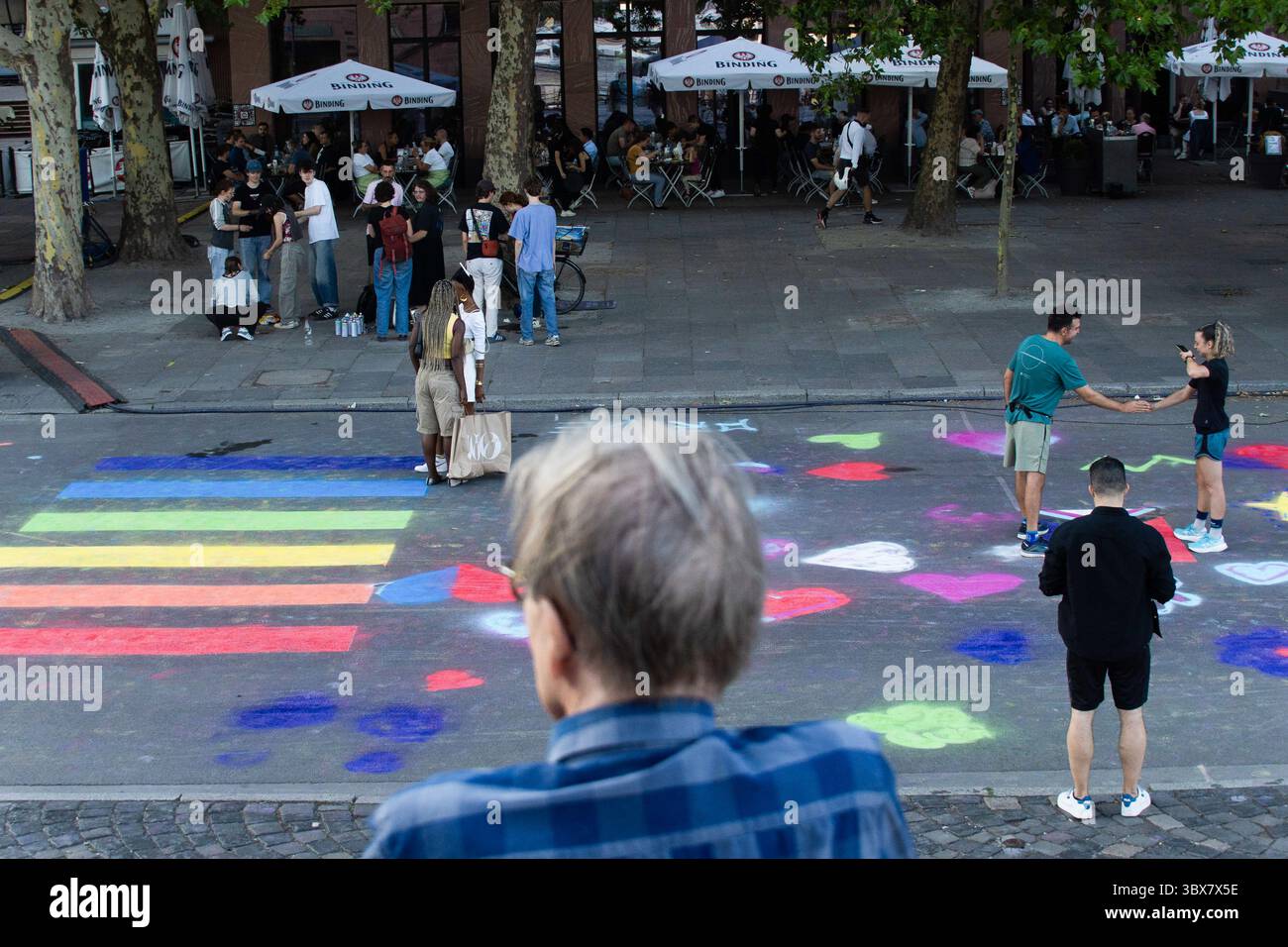 July 17, 2025, Frankfurt, Hesse, Germany: People spray-paint on the
