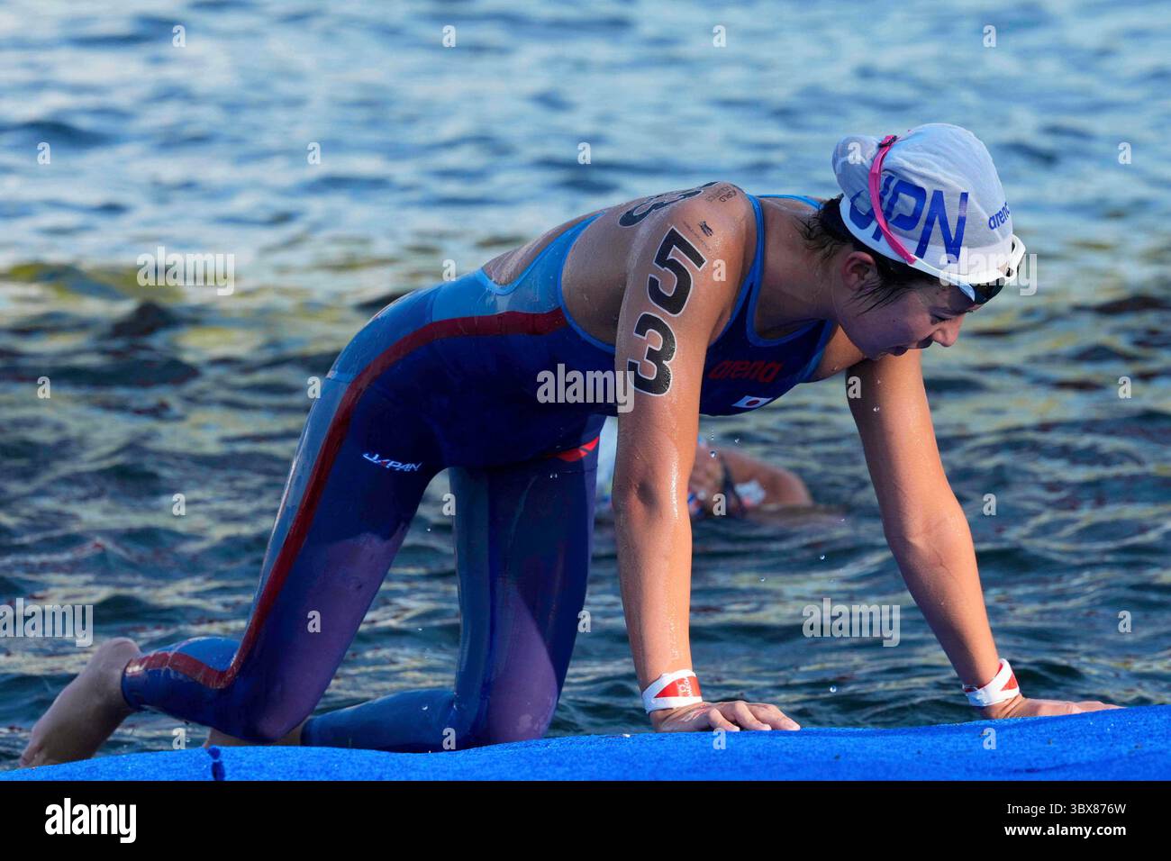 Ichika Kajimoto of Japan reacts after finishing third in the women's ...