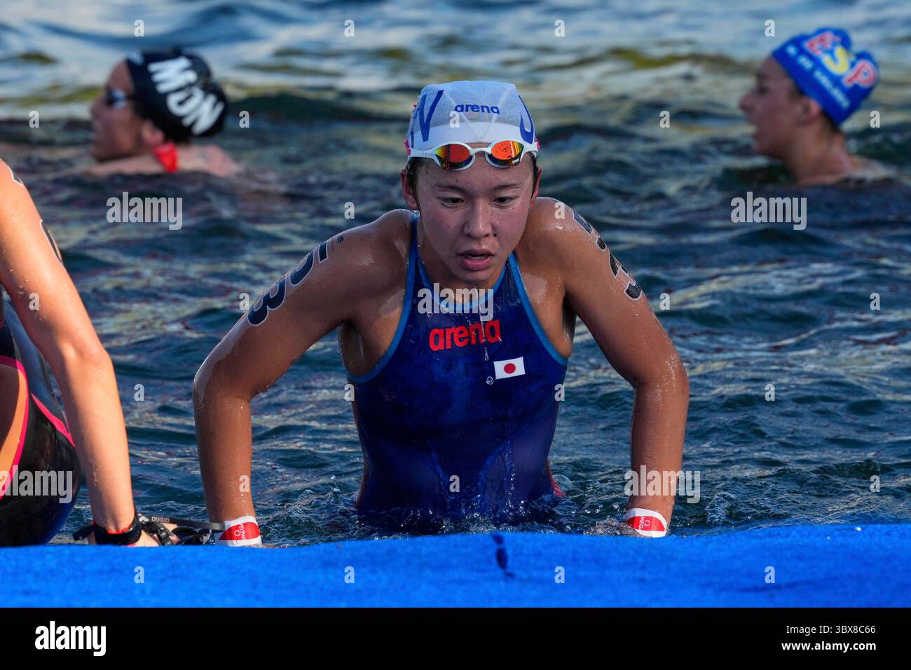 Ichika Kajimoto of Japan reacts after finishing third in the women's ...