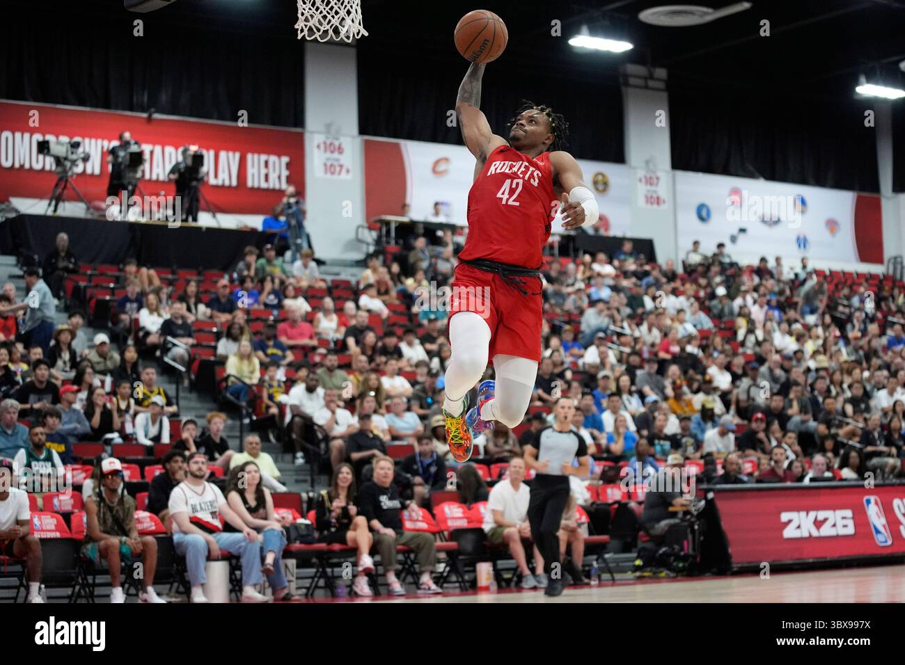 Houston Rockets’ Adonis Arms dunks against the Portland Trail Blazers