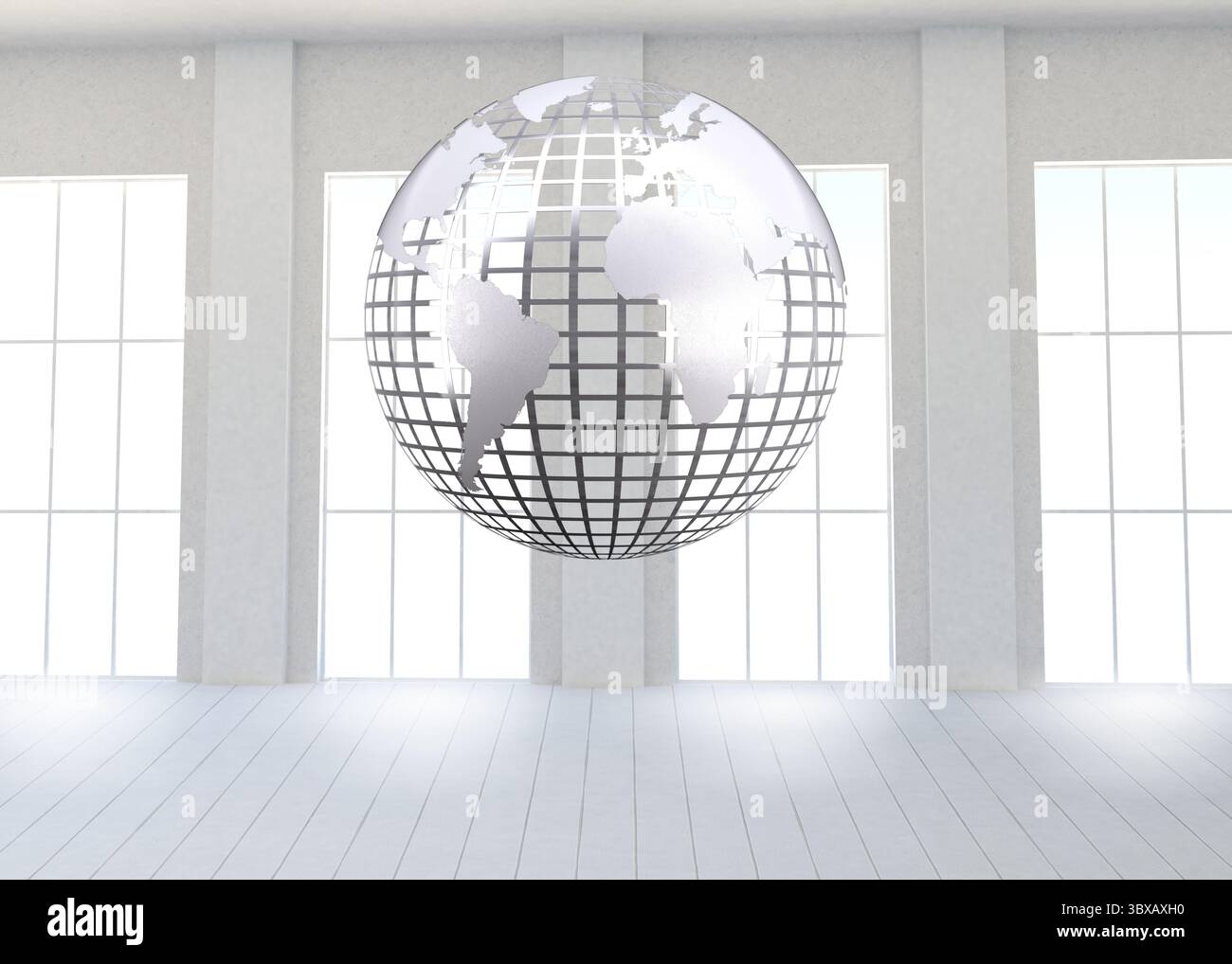 Silver globe floating in room Stock Photo