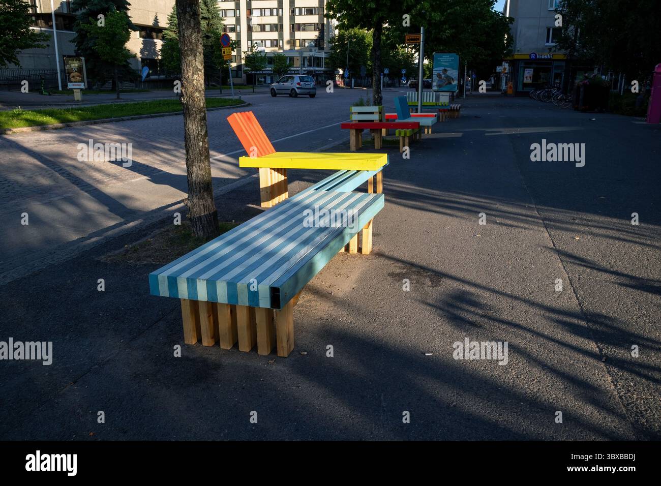 empty modern wooden park benches in urban public space, Oulu Finland ...