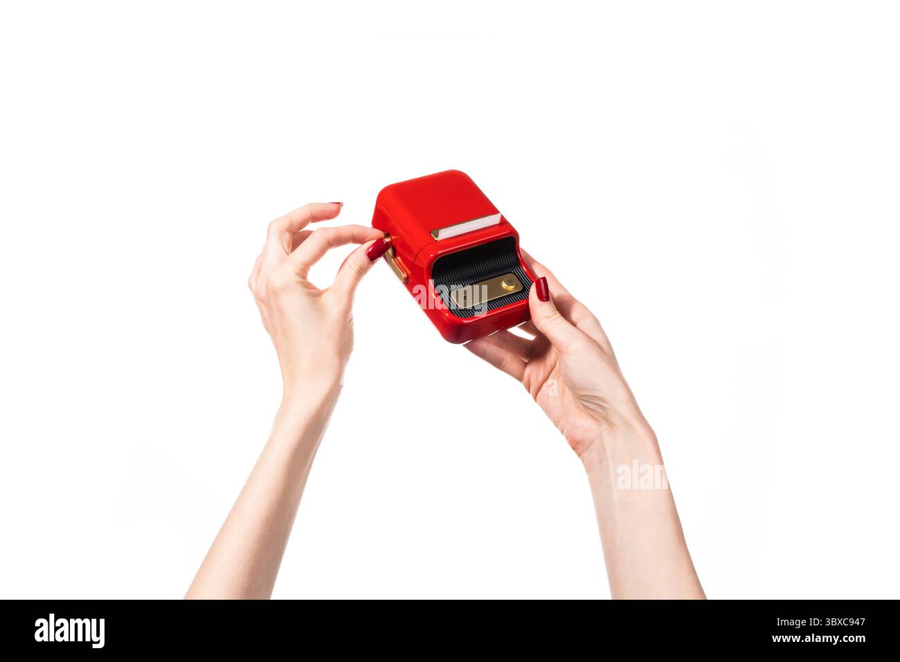 Small red printer for printing labels isolated on white background. Stock Photo