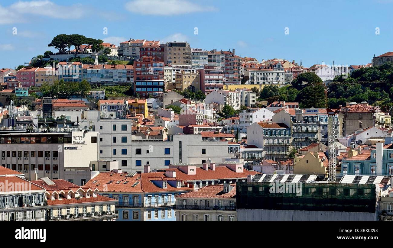 Lisbon Castle hill and terracota rooftops seen from Carmo Archaeological Museum Lisbon Portugal - Smartphone Captured Stock Image