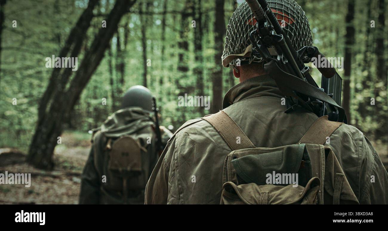 Two Soldiers in the Forest with Vintage Military Gear Stock Photo - Alamy