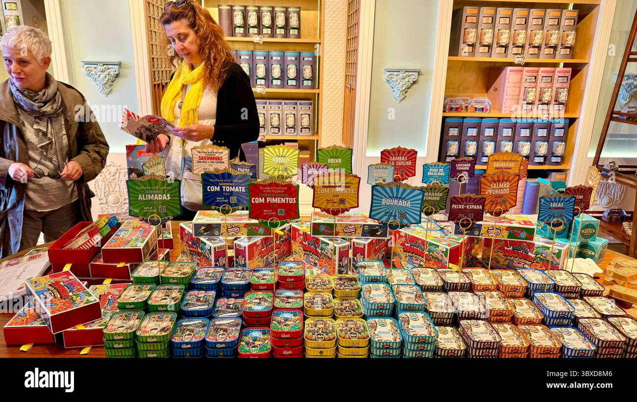 Customers in Comur tinned fish boutique shop in Coimbra Portugal - Smartphone Captured Stock Image