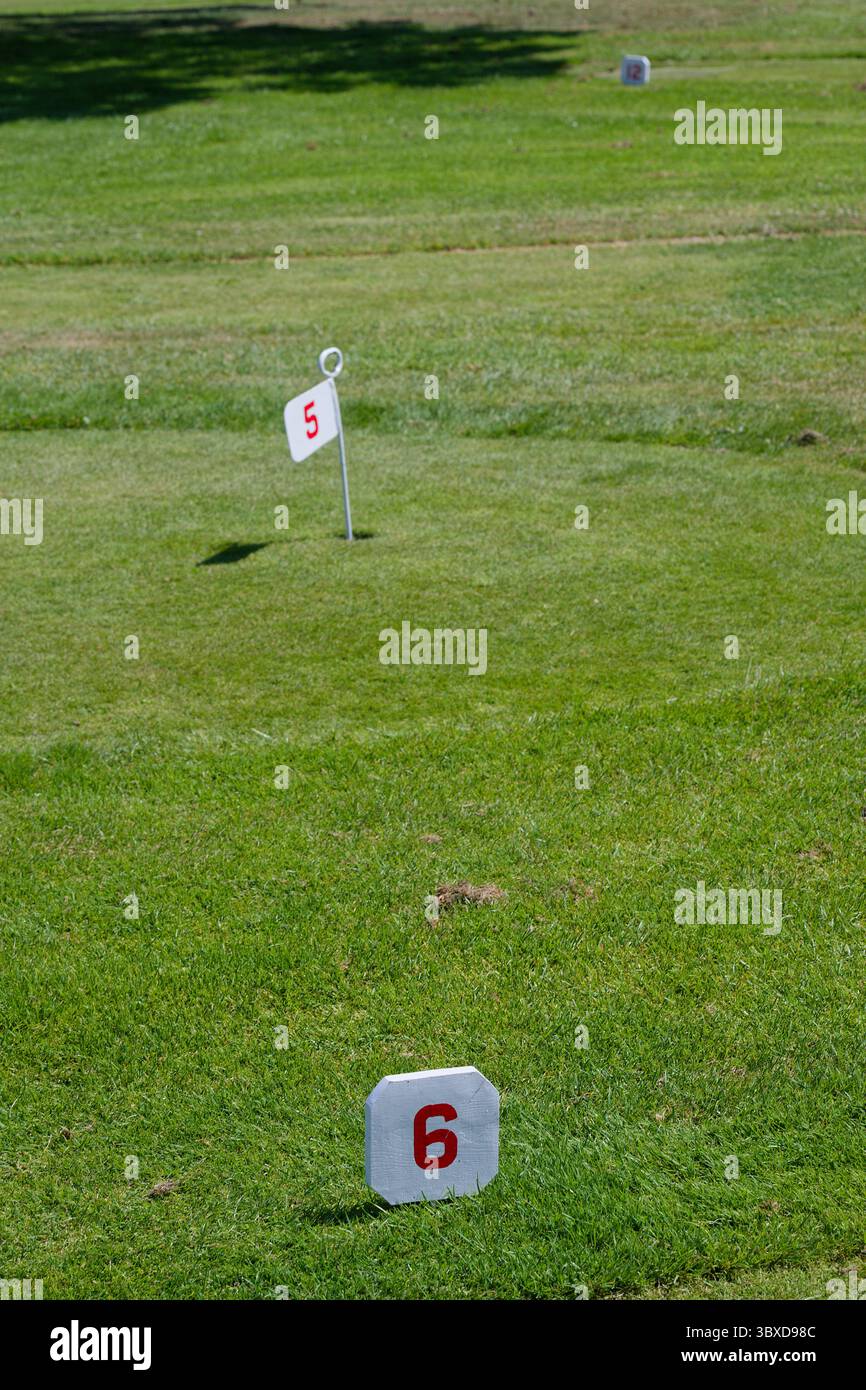 Mini golf. A small course for tourists at a seaside resort. Clock golf. Putting course. Stock Photo