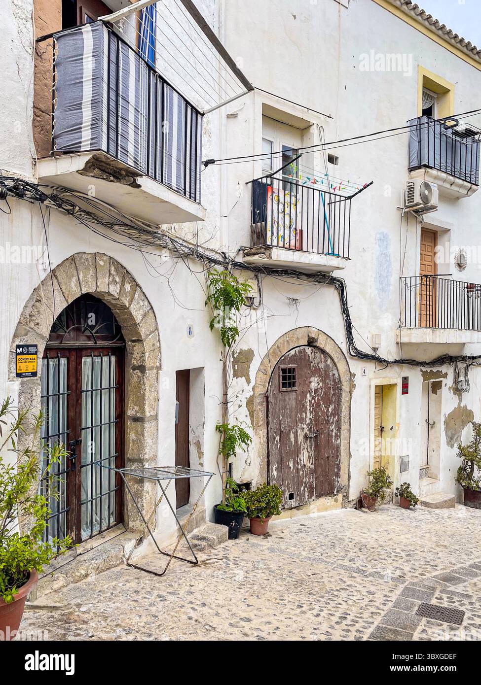 Tranquil cobbled streets and whitewashed buildings in the historic Dalt Vila, Ibiza, Balearic Islands, Spain: Phillip Roberts - Smartphone Captured Stock Image