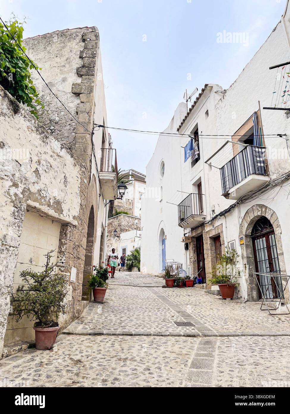 Tranquil cobbled streets and whitewashed buildings in the historic Dalt Vila, Ibiza, Balearic Islands, Spain: Phillip Roberts - Smartphone Captured Stock Image