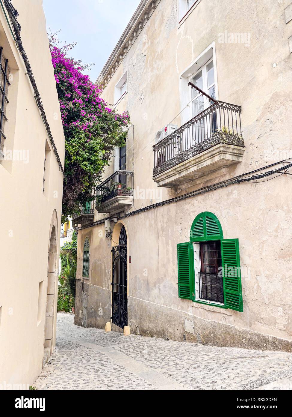 Tranquil cobbled streets and whitewashed buildings in the historic Dalt Vila, Ibiza, Balearic Islands, Spain: Phillip Roberts - Smartphone Captured Stock Image