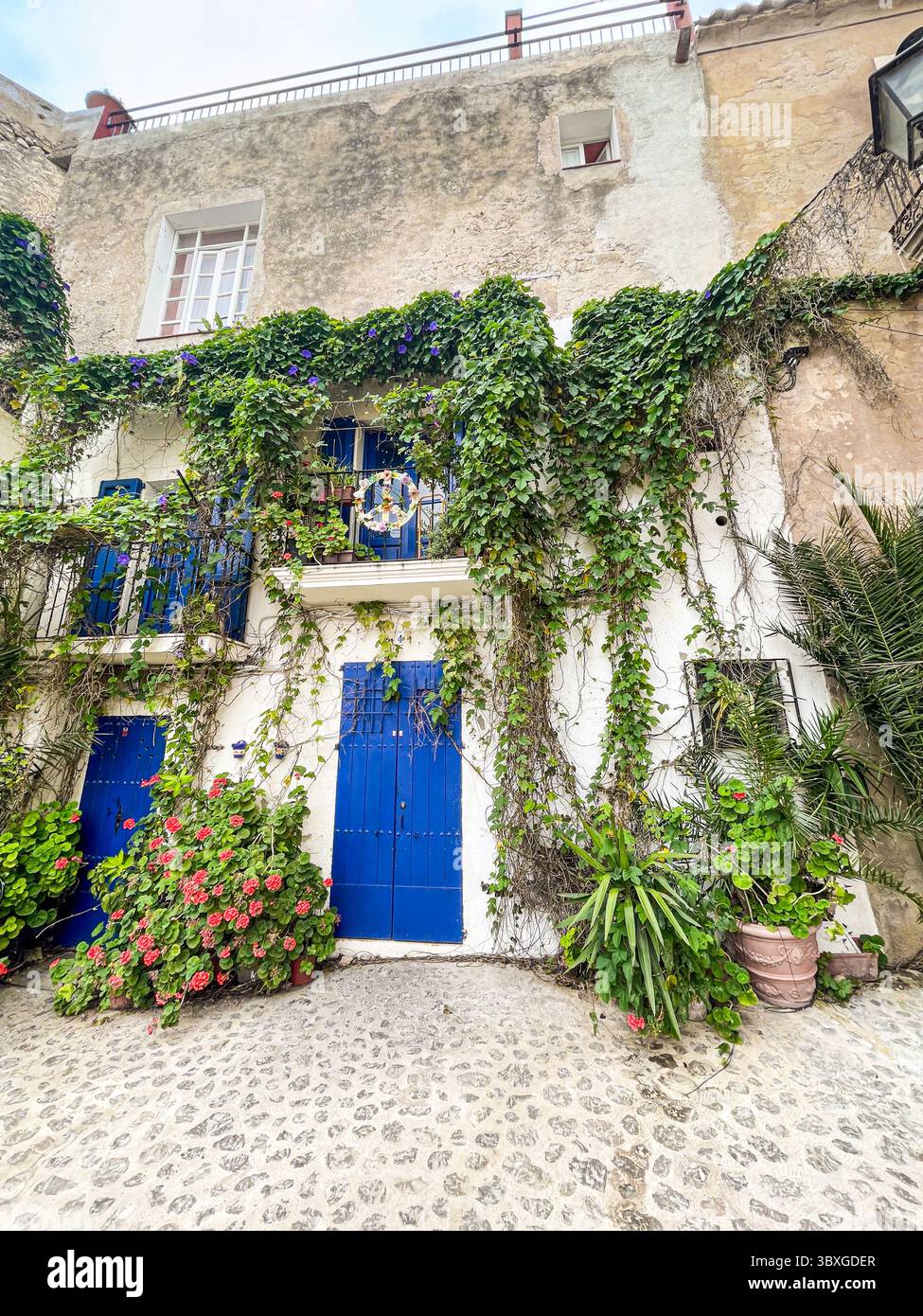 Tranquil cobbled streets and whitewashed buildings in the historic Dalt Vila, Ibiza, Balearic Islands, Spain: Phillip Roberts - Smartphone Captured Stock Image