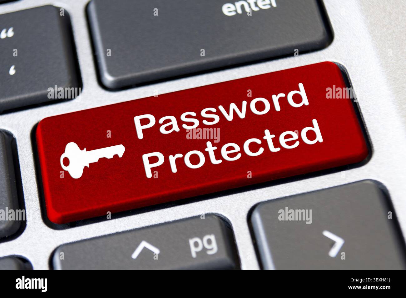 Password protected on red laptop keyboard button. Security and password concept Stock Photo