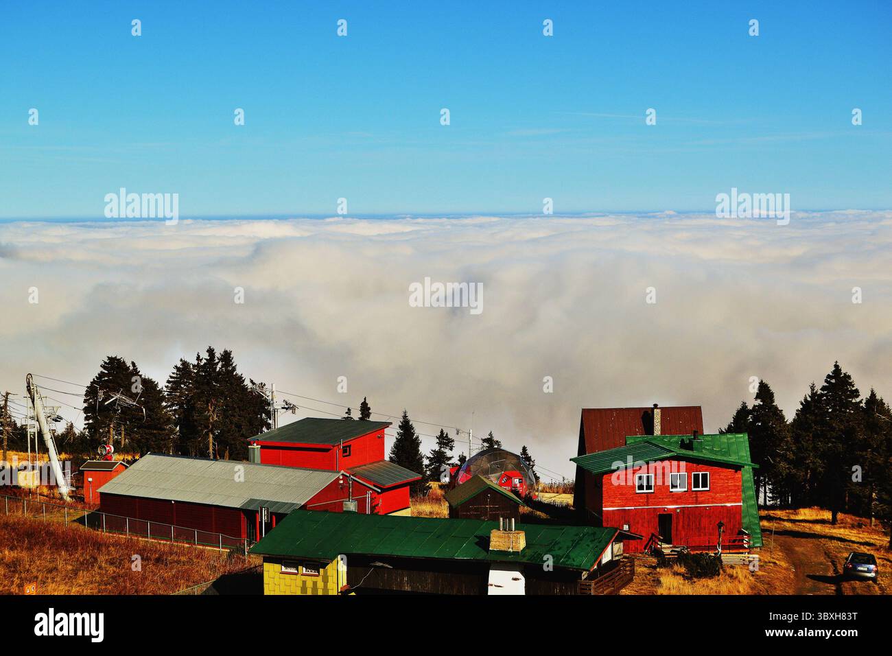 Aerial View of Hilltop Buildings Emerging from Inversion and Low Clouds ...