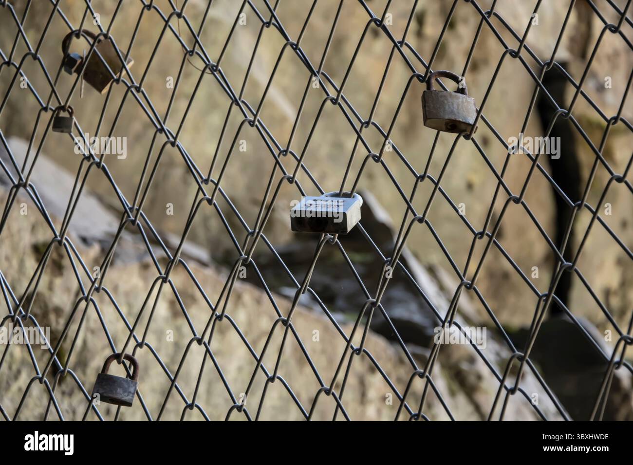 Locks on chainlink hi-res stock photography and images - Alamy
