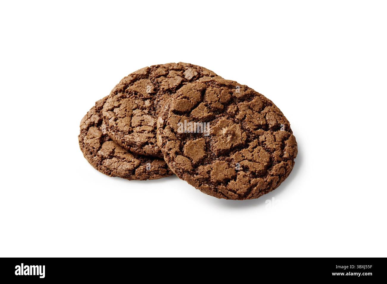 Classic chocolate sugar cookies, crunchy rich chocolatey flavor dessert with cracked surface, isolated on white background Stock Photo