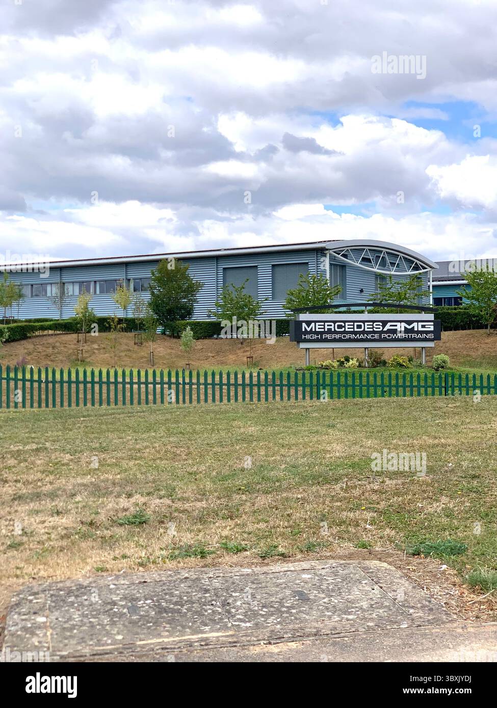 Mercedes AMG works working make fit repair Brixworth Northamptonshire UK British place racing car cars engineering make made F1 race drivers fast - Smartphone Captured Stock Image