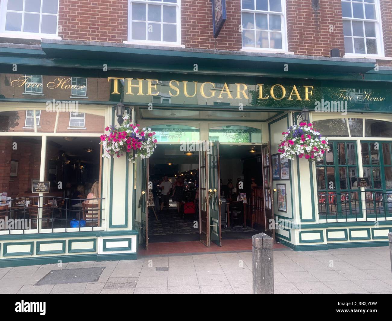 Market  Harborough Northamptonshire UK Town Village place pub bar shop shops shopping outside holidays holiday walking walk plants old Naseby - Smartphone Captured Stock Image