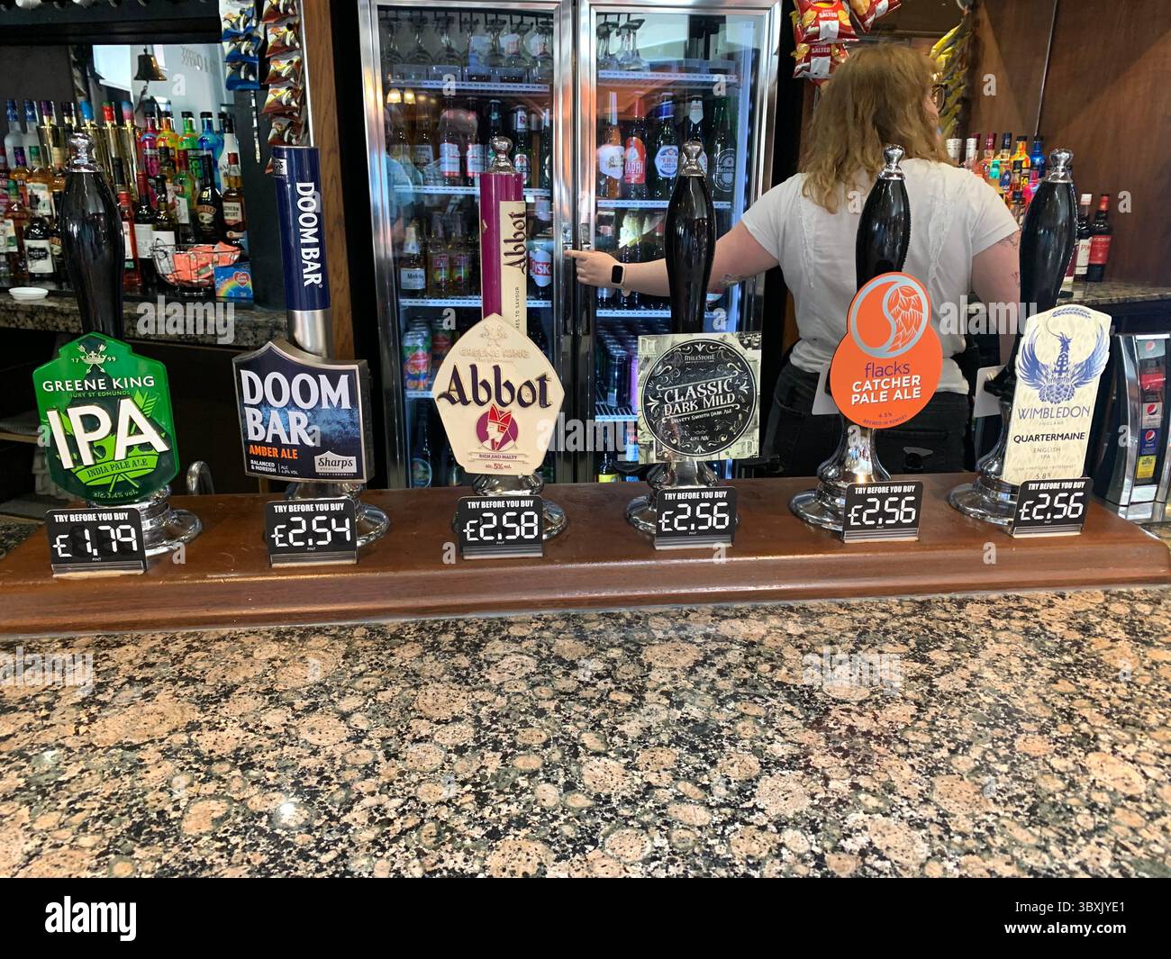 Market  Harborough Northamptonshire UK Town Village place pub bar shop shops shopping outside holidays holiday walking walk plants old Naseby - Smartphone Captured Stock Image