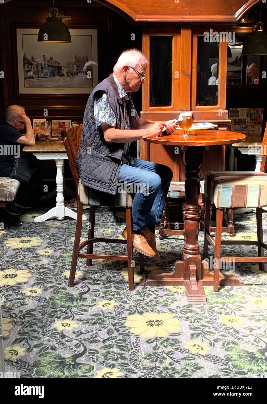 Market  Harborough Northamptonshire UK Town Village place pub bar shop shops shopping outside holidays holiday walking walk plants old Naseby - Smartphone Captured Stock Image