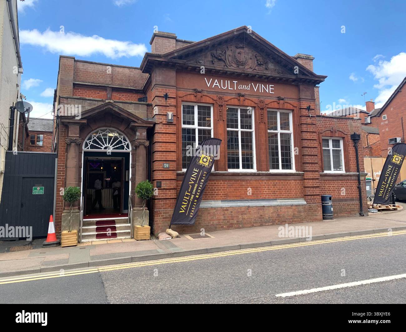 Market  Harborough Northamptonshire UK Town Village place pub bar shop shops shopping outside holidays holiday walking walk plants old Naseby - Smartphone Captured Stock Image
