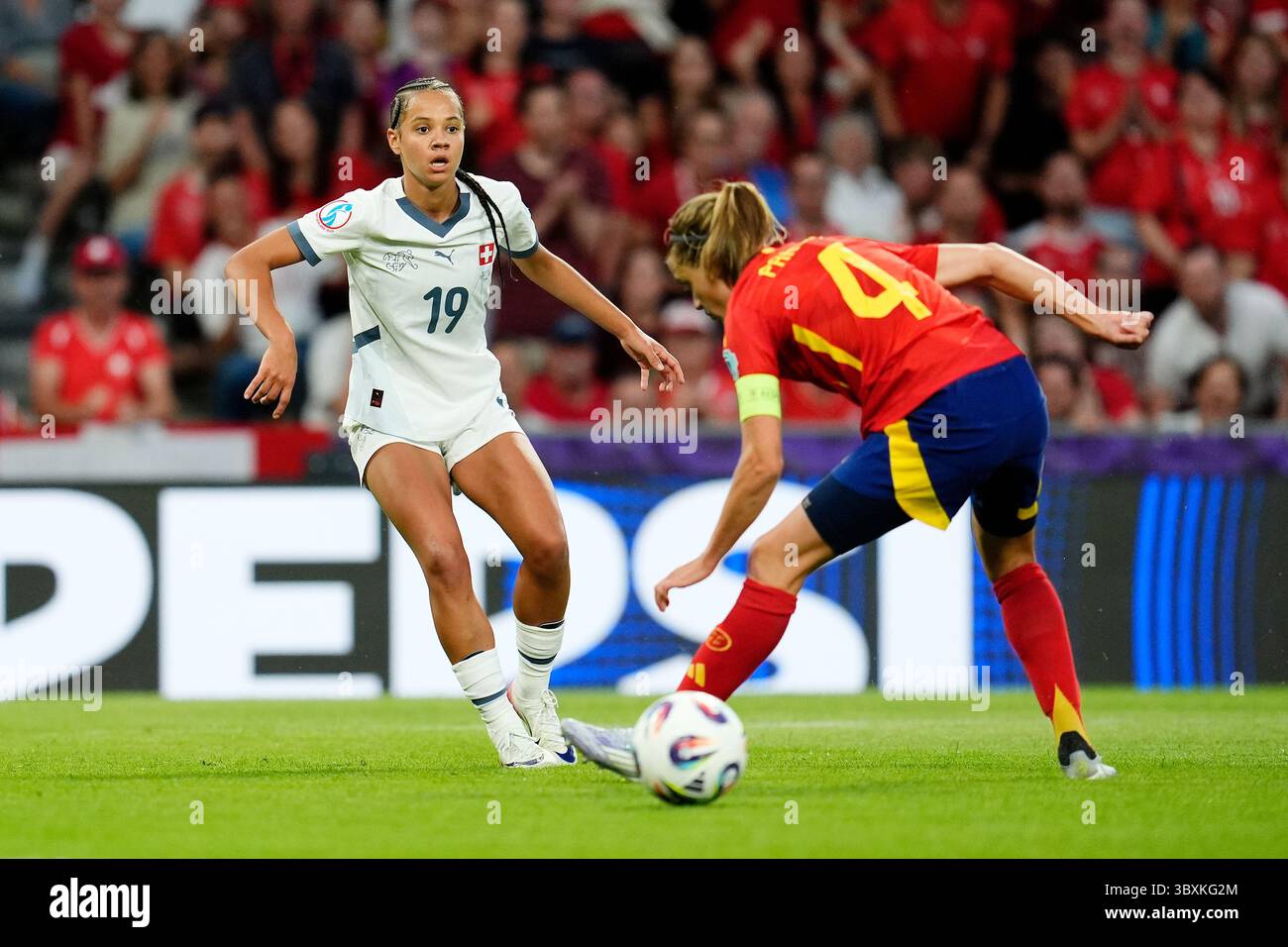 Switzerland’s Iman Beney (left) and Spain’s Irene Paredes in action