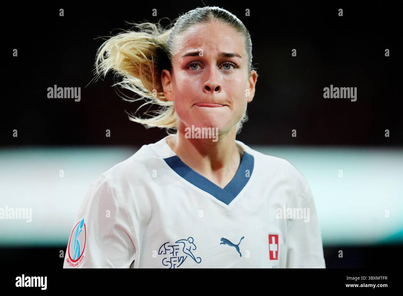 Switzerland’s Nadine Riesen reacts as she leaves the pitch as a