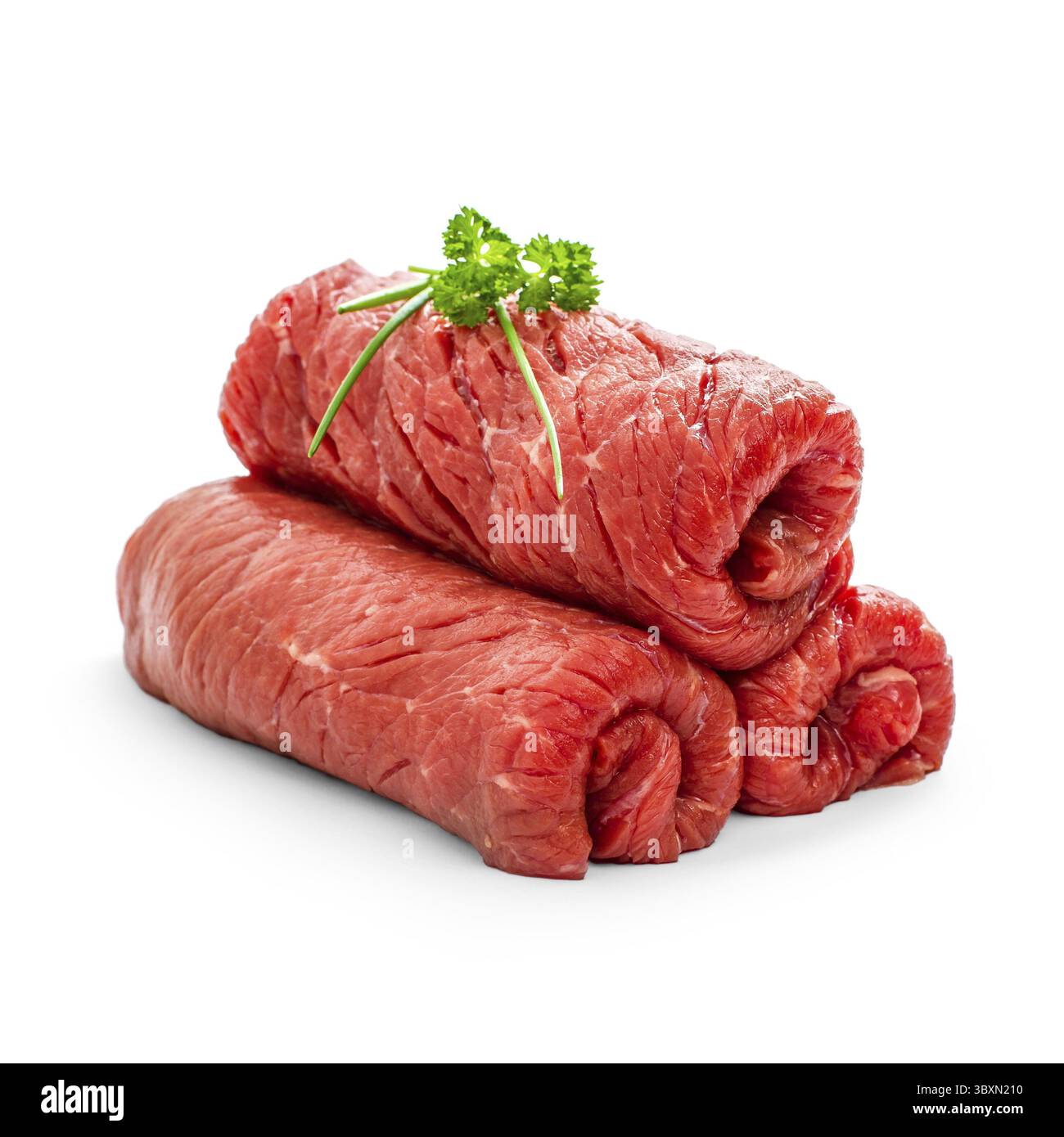 Three raw rouladen beef isolated on white, close up Stock Photo