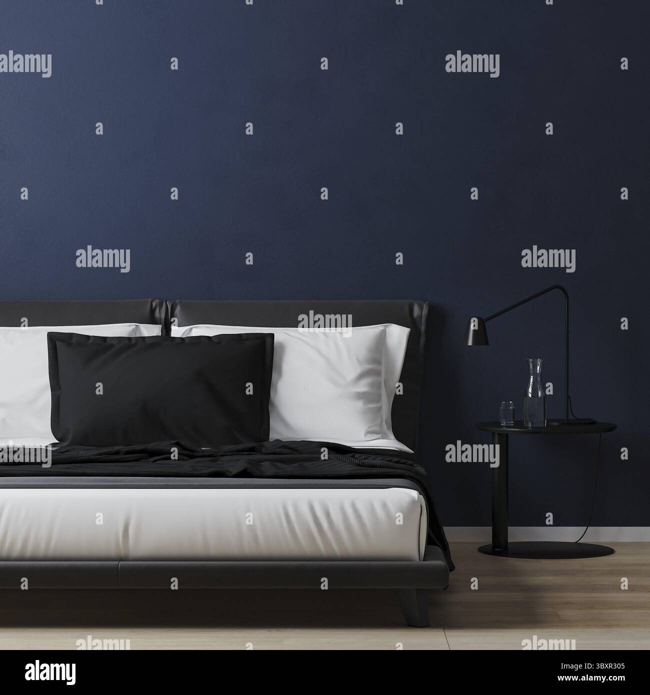 Bed with white and blue pillows with bedding table in room with dark blue wall, 3d rendering Stock Photo