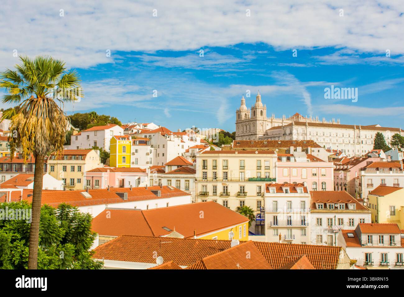 Skyline with Monastery of St. Vincent or Monastery of Sao Vicente de Fora on the hill, Alfama district, Lisbon, Portugal. Stock Photo