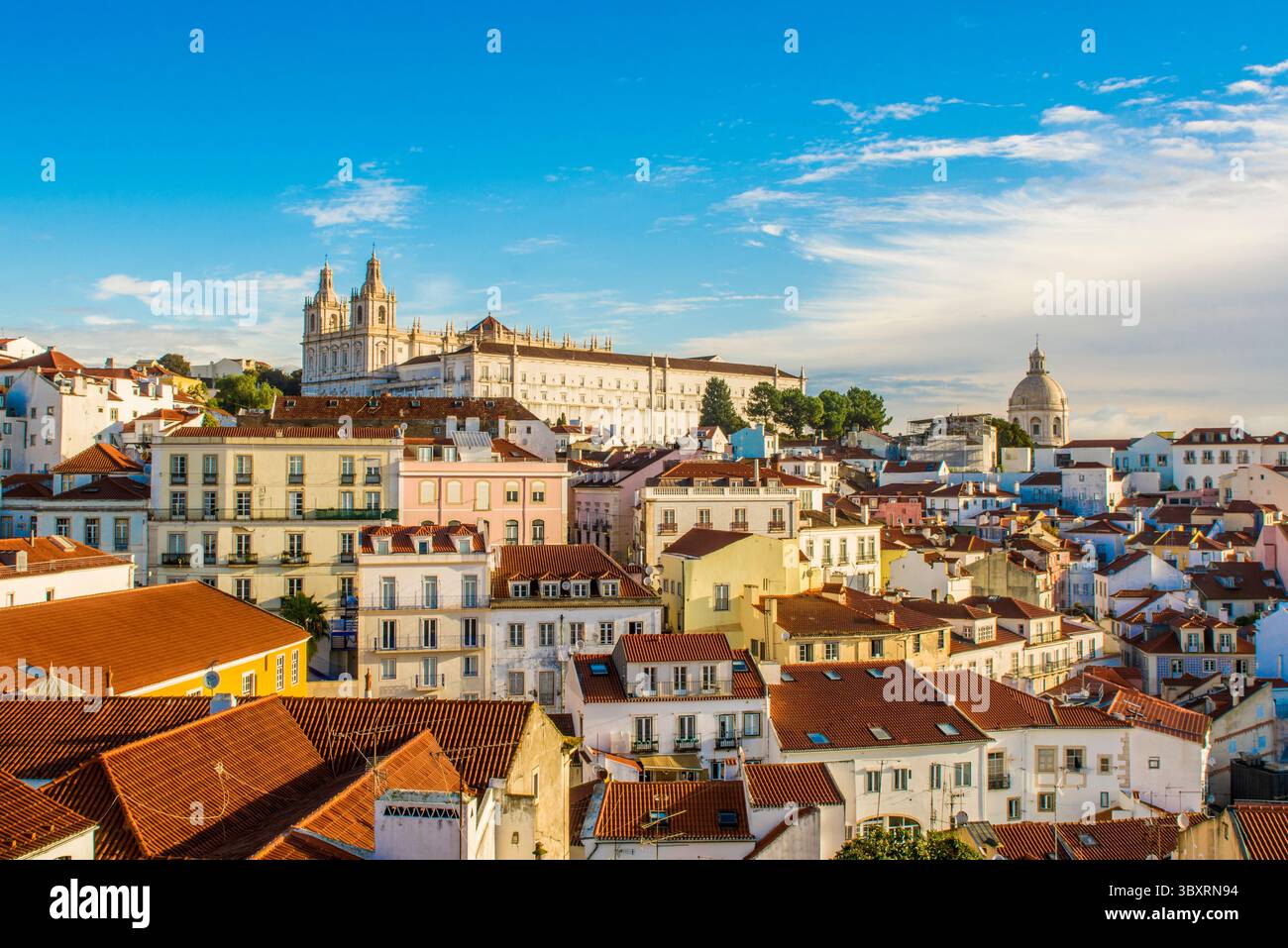Skyline with Monastery of St. Vincent or Monastery of Sao Vicente de Fora on the hill, Alfama district, Lisbon, Portugal. Stock Photo