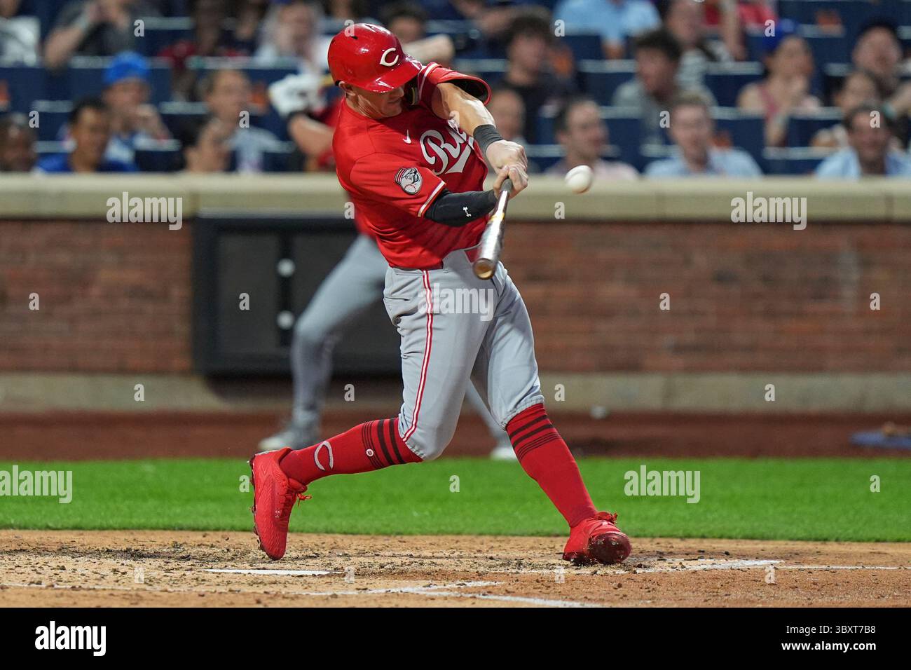 Cincinnati Reds’ Austin Hays hits a home run during the sixth inning of