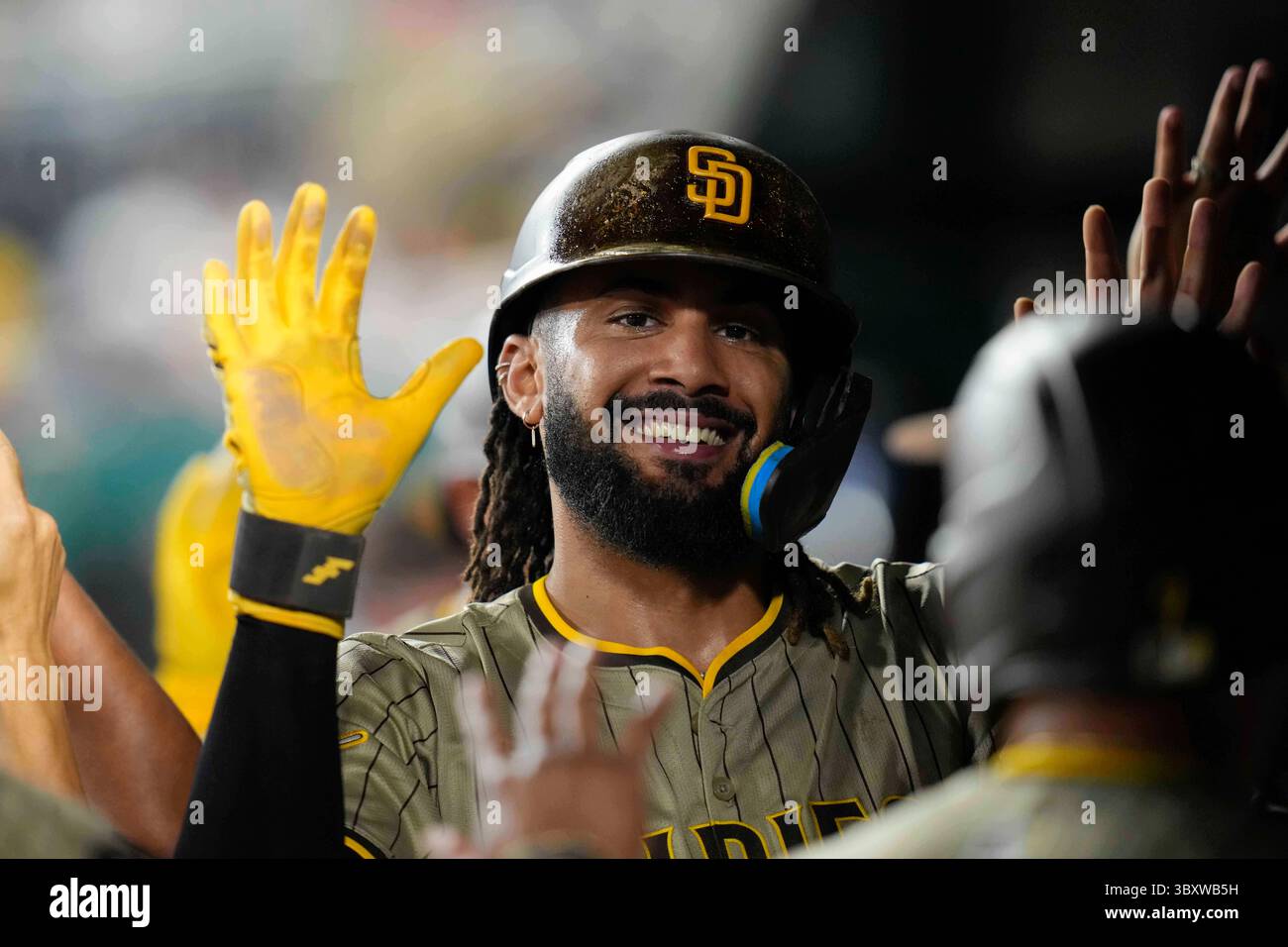 San Diego Padres' Fernando Tatis Jr. celebrates with teammates in the ...