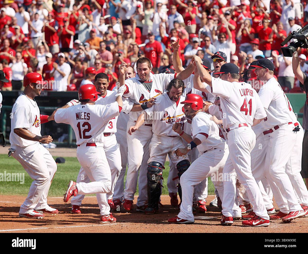 San Diego Padres players congratulate Donovan Solano (39) after he hit a  walk-off single during the 10th inning of a baseball game against the Los  Angeles Dodgers, Tuesday, July 30, 2024, in