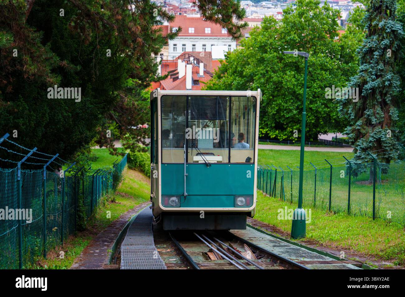 A scenic cable car ride in Prague, Czech Republic. A journey through the greenery of Petan Hill. Stock Photo