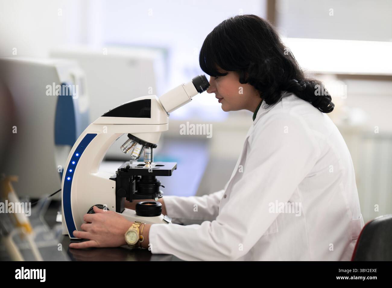 Doctor scientist using microscope in laboratory Stock Photo - Alamy