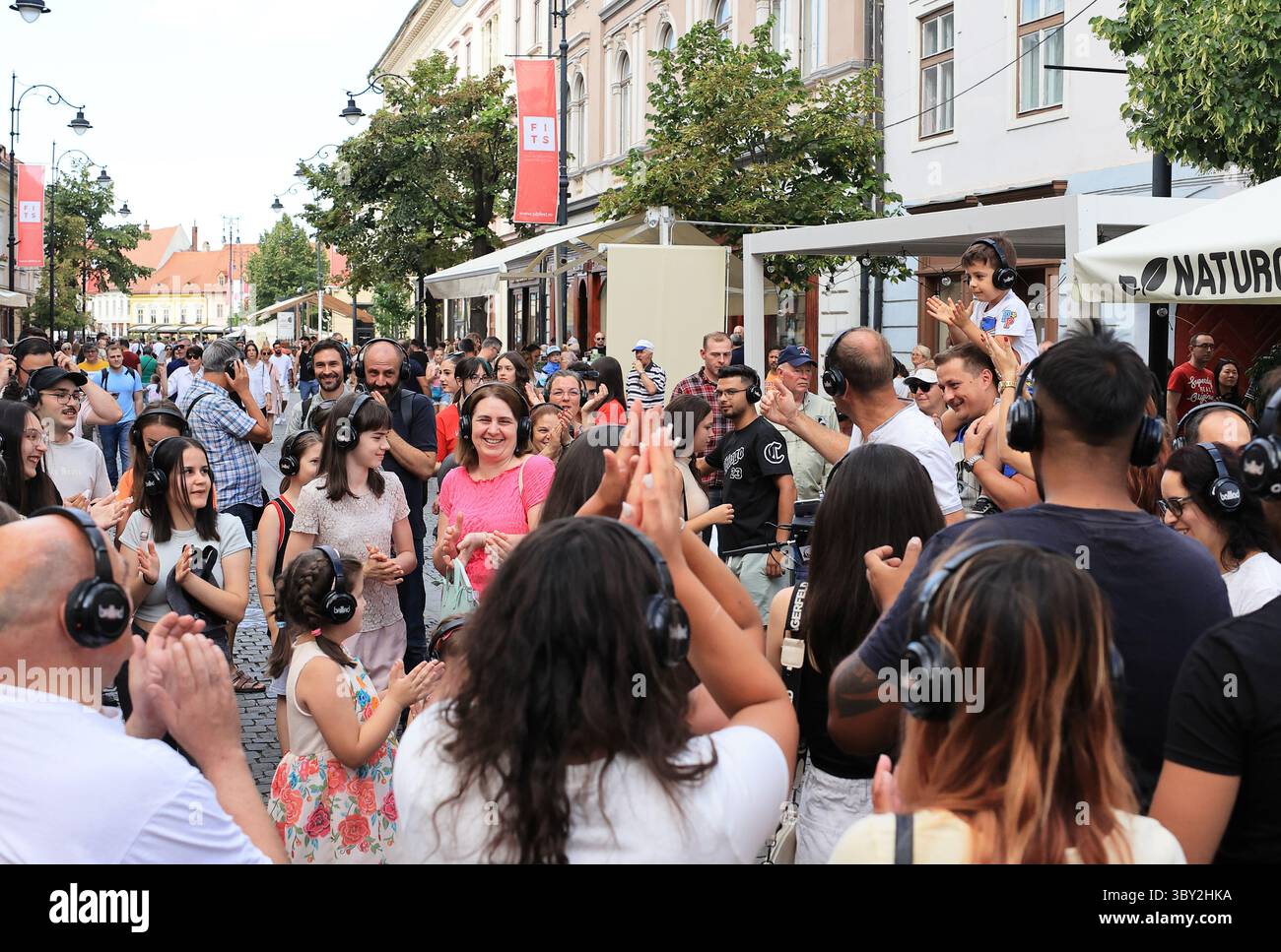 Strada Nicolae Balcescu busy during Sibiu's annual summer FITS, the International Theatre, Festival, in Romania. Stock Photo